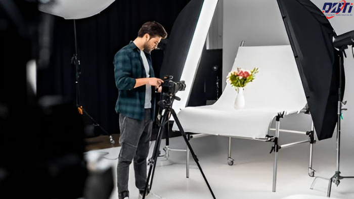 A photographer clicking a professional shot of a product.